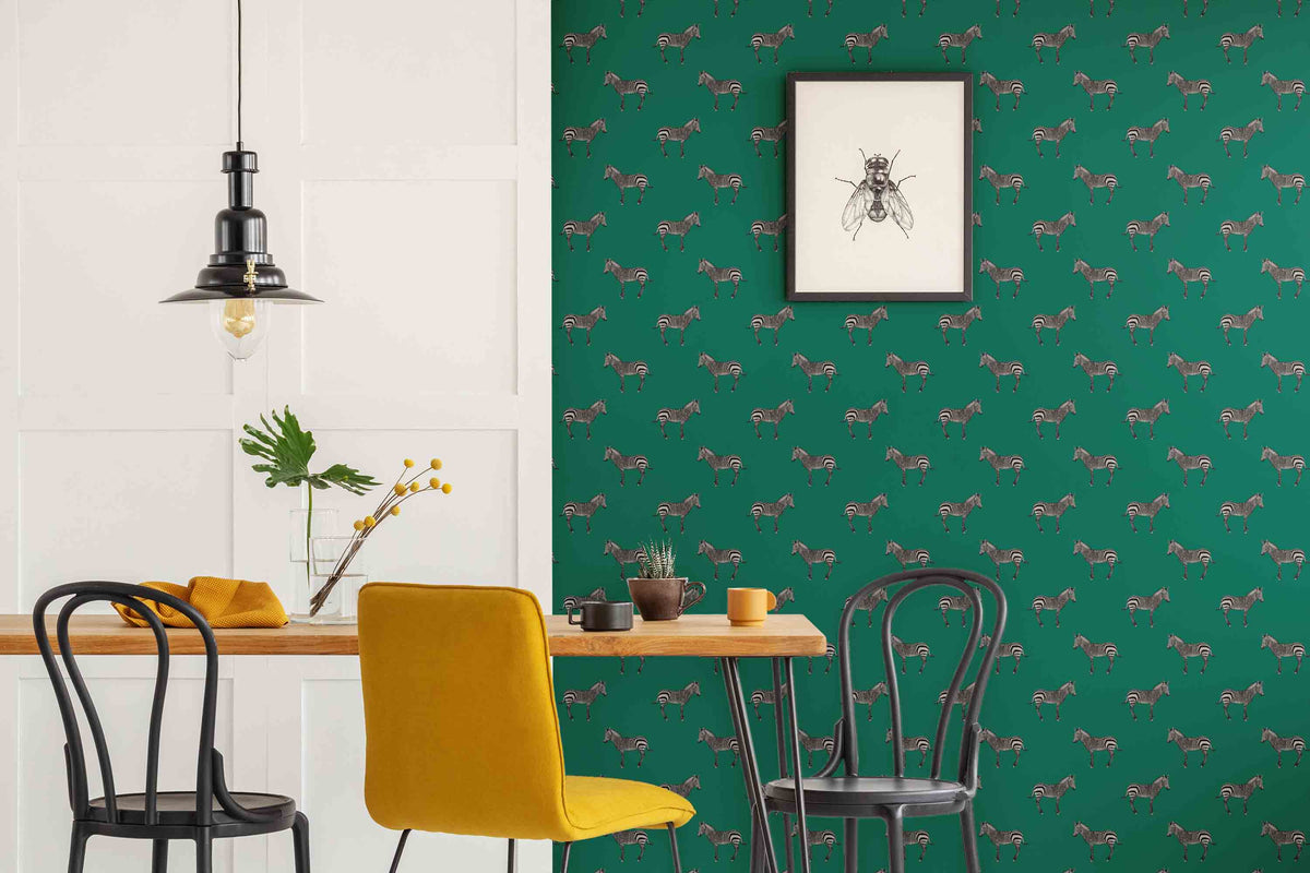 Green wallpaper in emerald green in a kitchen diner