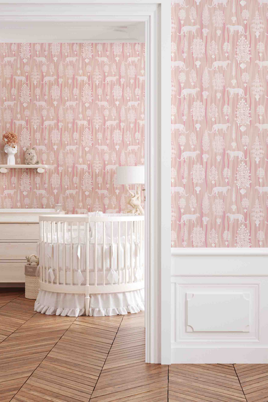 Pale pink animal wallpaper featuring Jaguar big cats and ornate leafy trees on a wavy painterly background on nursery walls