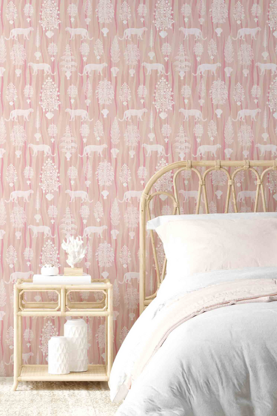 A pale pink animal bedroom wallpaper featuring  Jaguar big cats and ornate palms - Jag About wallpaper by Milola Design