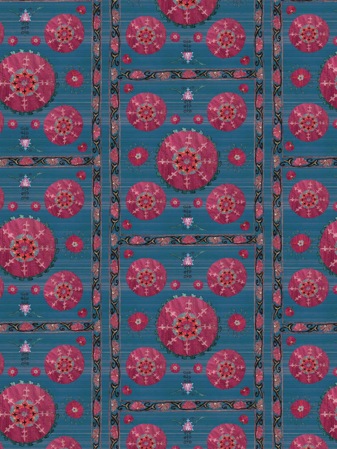 Azure blue Suzani grasscloth wallpaper featuring intricate floral motifs and geometric patterns in vibrant pink.