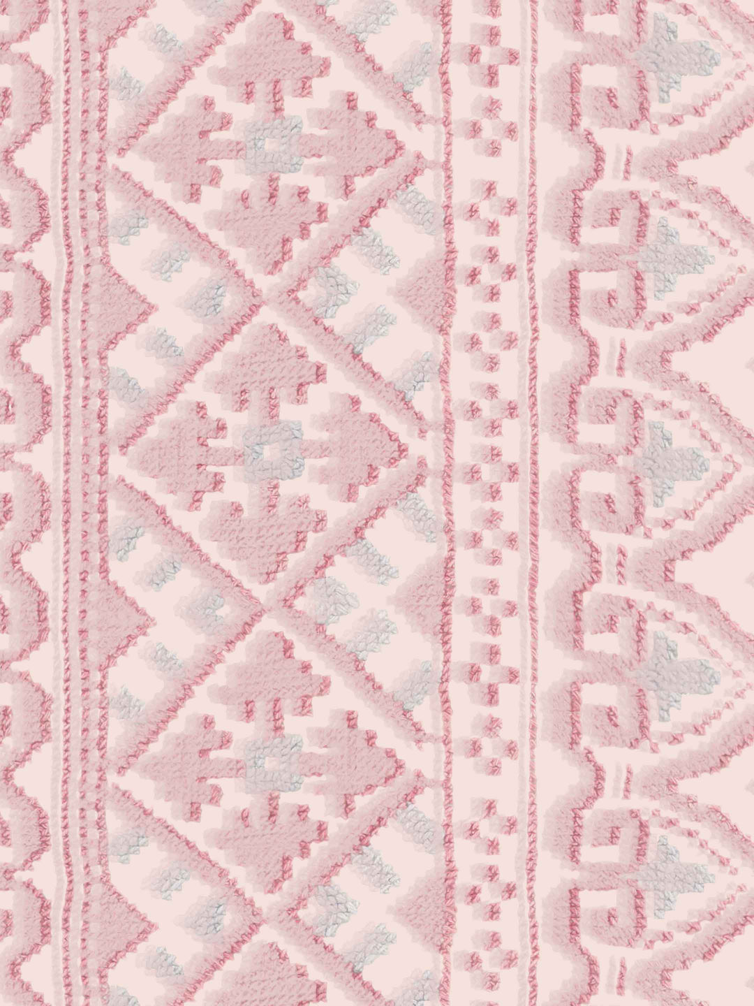 Close-up of a pink and white geometric patterned wallpaper design
