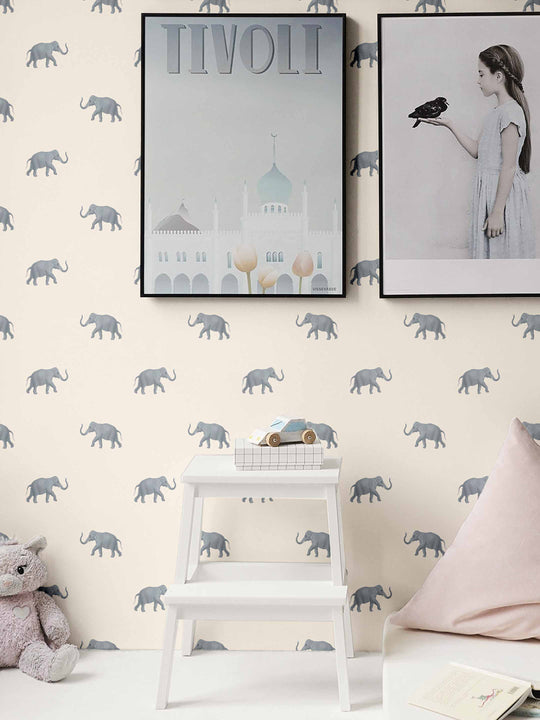 Grey elephant wallpaper with a cream background on a kids bedroom wall by Milola Design