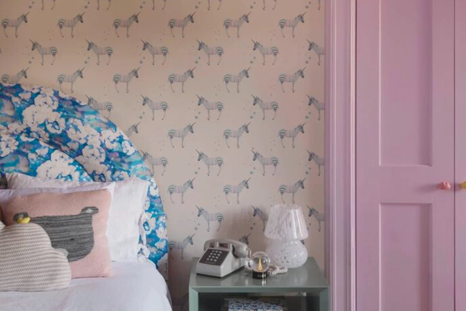 Girls bedroom decorated with designer wallpaper by Milola Design