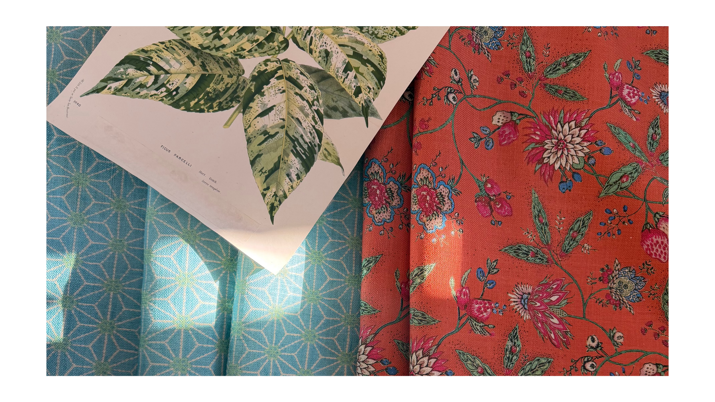 Two fabric swatches, one with a green leaf pattern and the other with a floral pattern on an orange background.