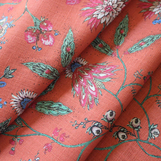 Close up of a Orange floral curtain fabric 