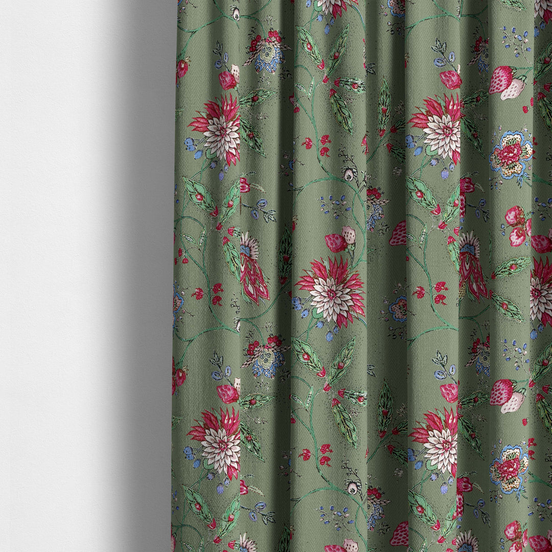 Amalita Floral Fabric in moss green with pink and blue flowers, perfect for curtains and upholstery.