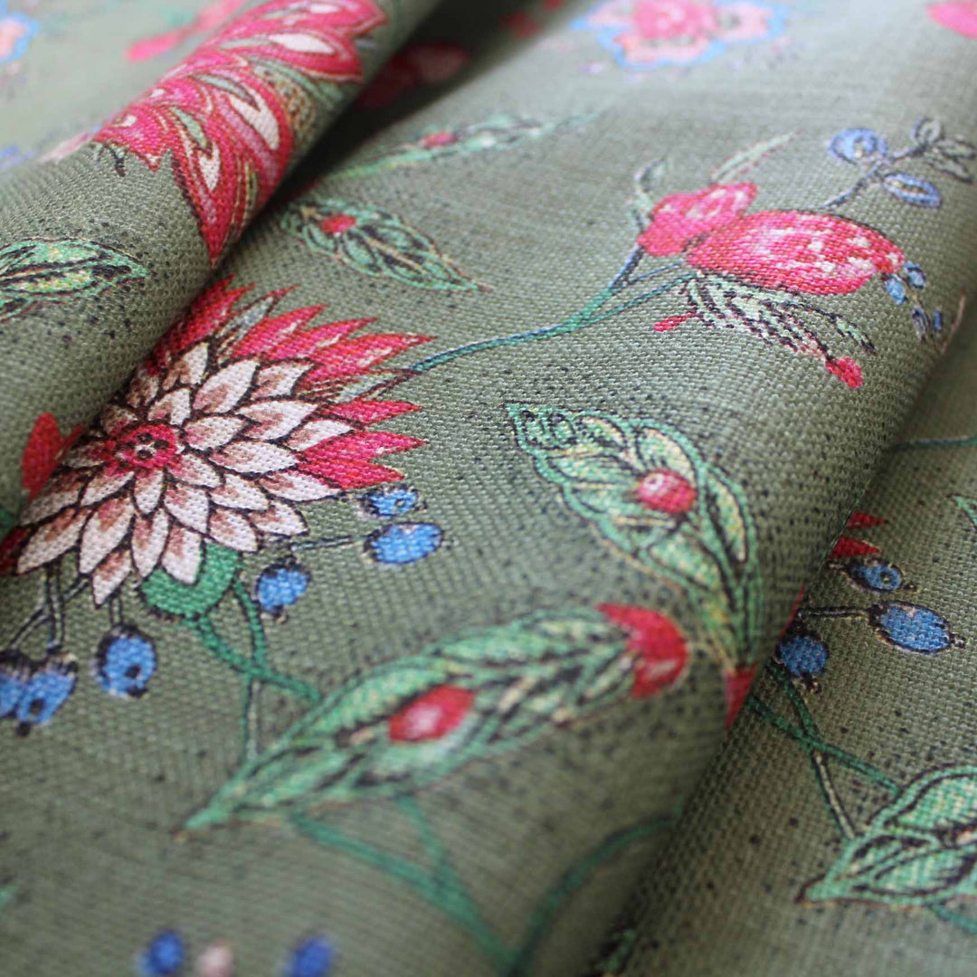 Amalita Floral Fabric - Moss Green with pink and blue floral design, perfect for curtains and upholstery.