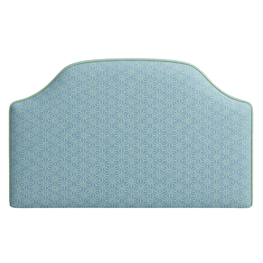 Blue patterned headboard fabric for spring with stars on a white background