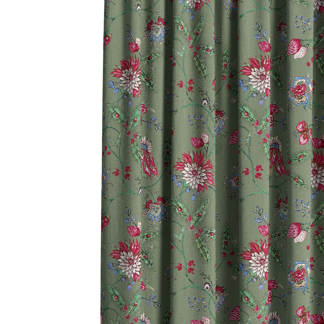 Floral patterned fabric on a green background