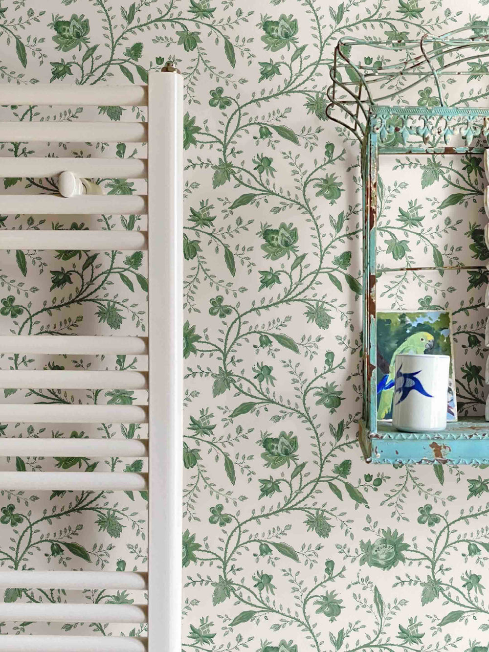Vintage green floral wallpaper in bathroom