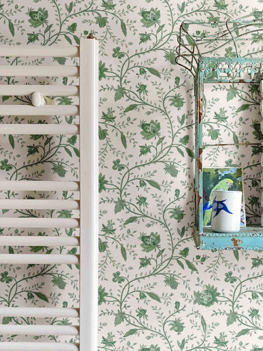 Vintage green floral wallpaper in bathroom