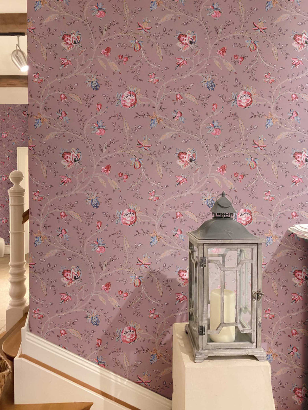 Indienne floral wallpaper in plum decorating hallway walls