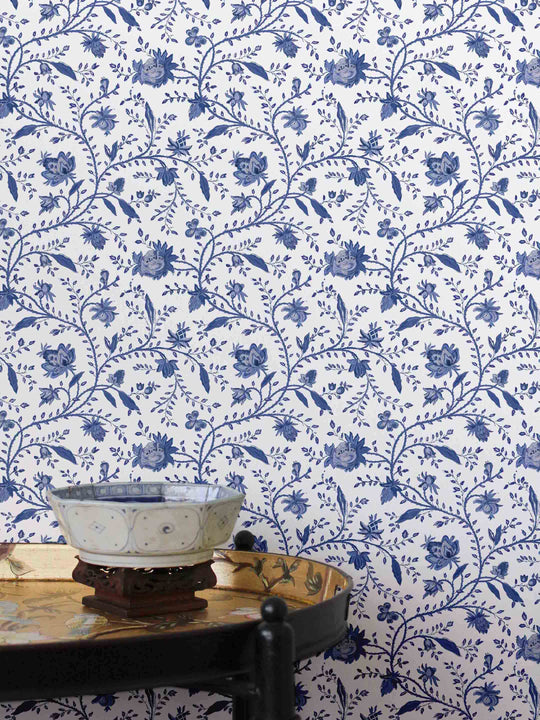 Home wallpaper with blue floral pattern on a white background