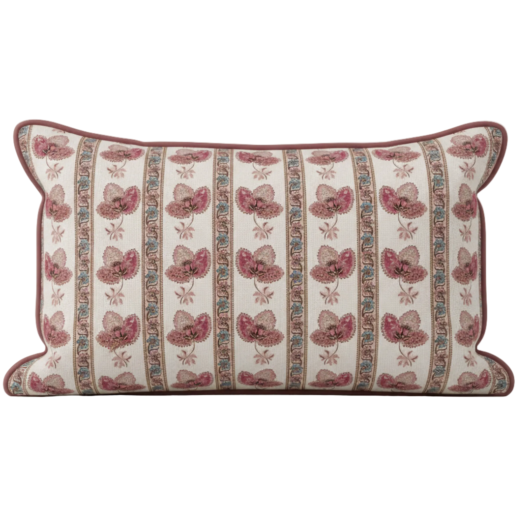 Decorative pillow with pink floral pattern on a white background for soft furnishing and interior decor