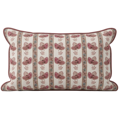Decorative pillow with pink floral pattern on a white background for soft furnishing and interior decor