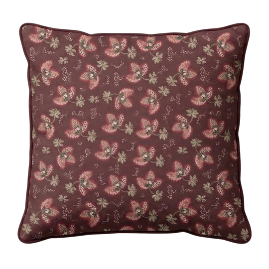 Decorative pillow with floral pattern in wine red