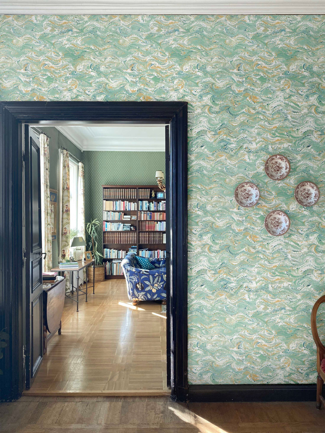 pale green marbled wallpaper on interior walls