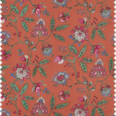 Amalita floral fabric in Burnt Orange — Indienne-inspired pink and powder blue floral motif on a burnt orange linen-viscose ground
