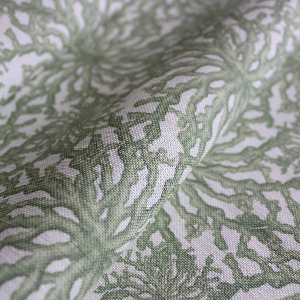 Sage green designer linen curtain fabric featuring a delicate coral pattern by Milola Design.