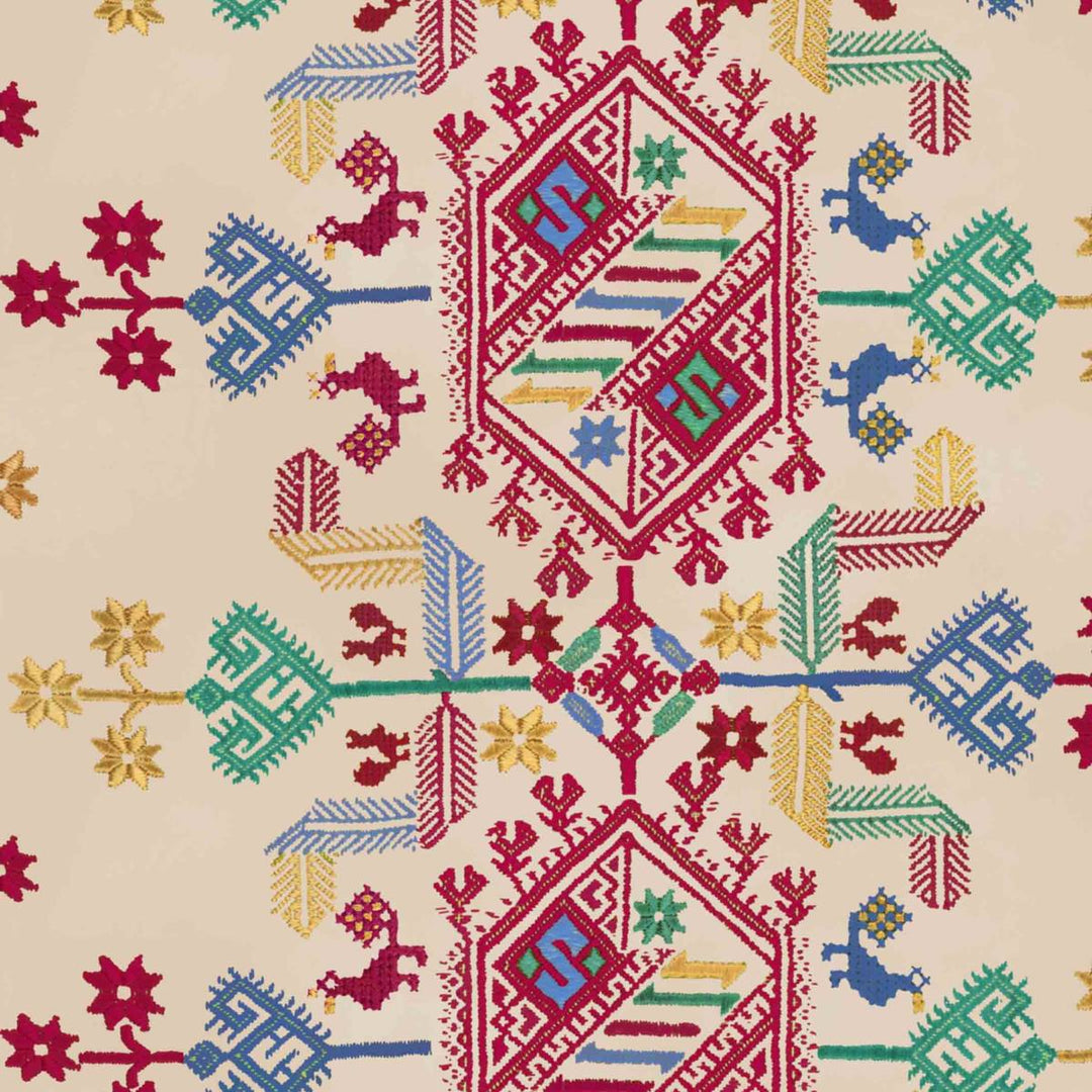 A ethnic geometric patterned wallpaper for walls featuring deep red, blue, green and yellow on a beige background