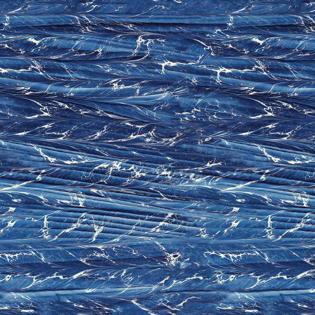Close-up of a home wallpaper design with blue marbled texture with white veins