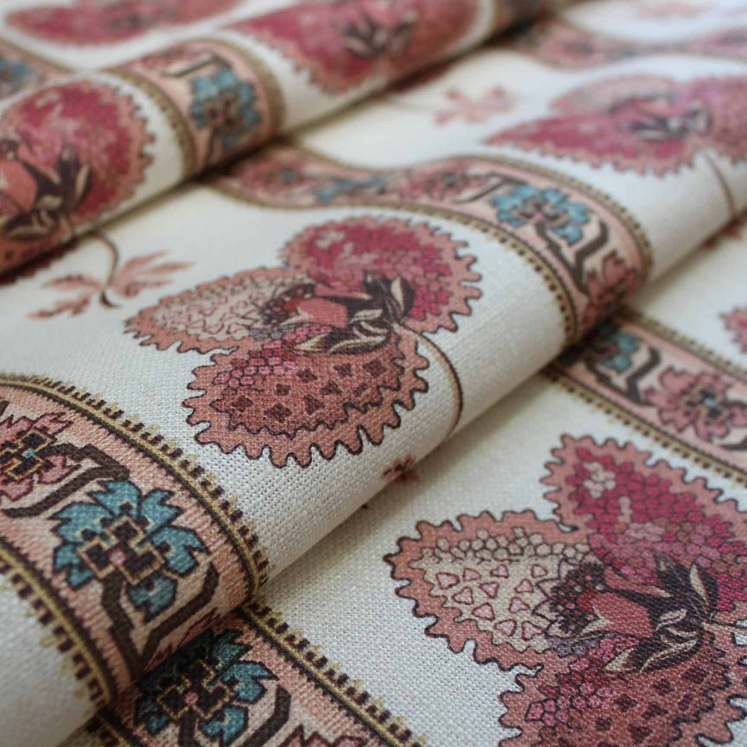 Close up image of a pretty floral stripe home furnishing fabric