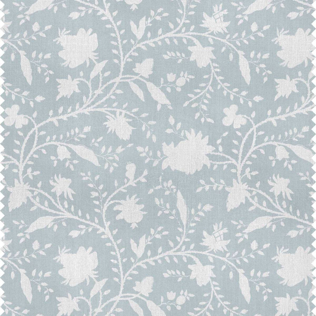 A product image of a pale blue and white floral fabric for curtains, blinds and soft furnishings by Milola Design