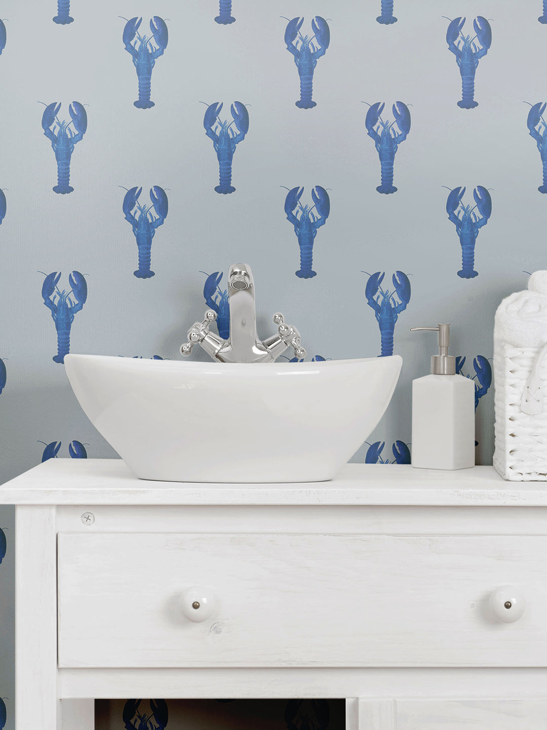 A bathroom decorated with blue grey lobster wallpaper by Milola Design