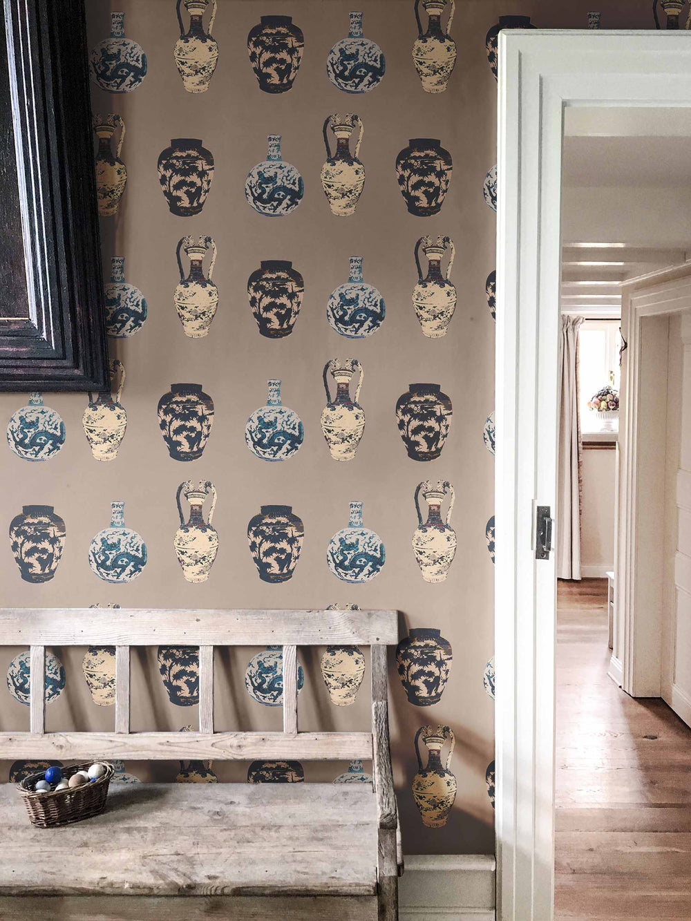 A hallway wall adorned with a beige wallpaper featuring antique Chinese vase designs by MIlola Design