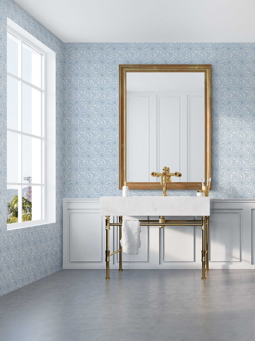 A bathroom wallpapered in a pale blue and white coral patterned wallpaper  - Coral Haze by Milola Design