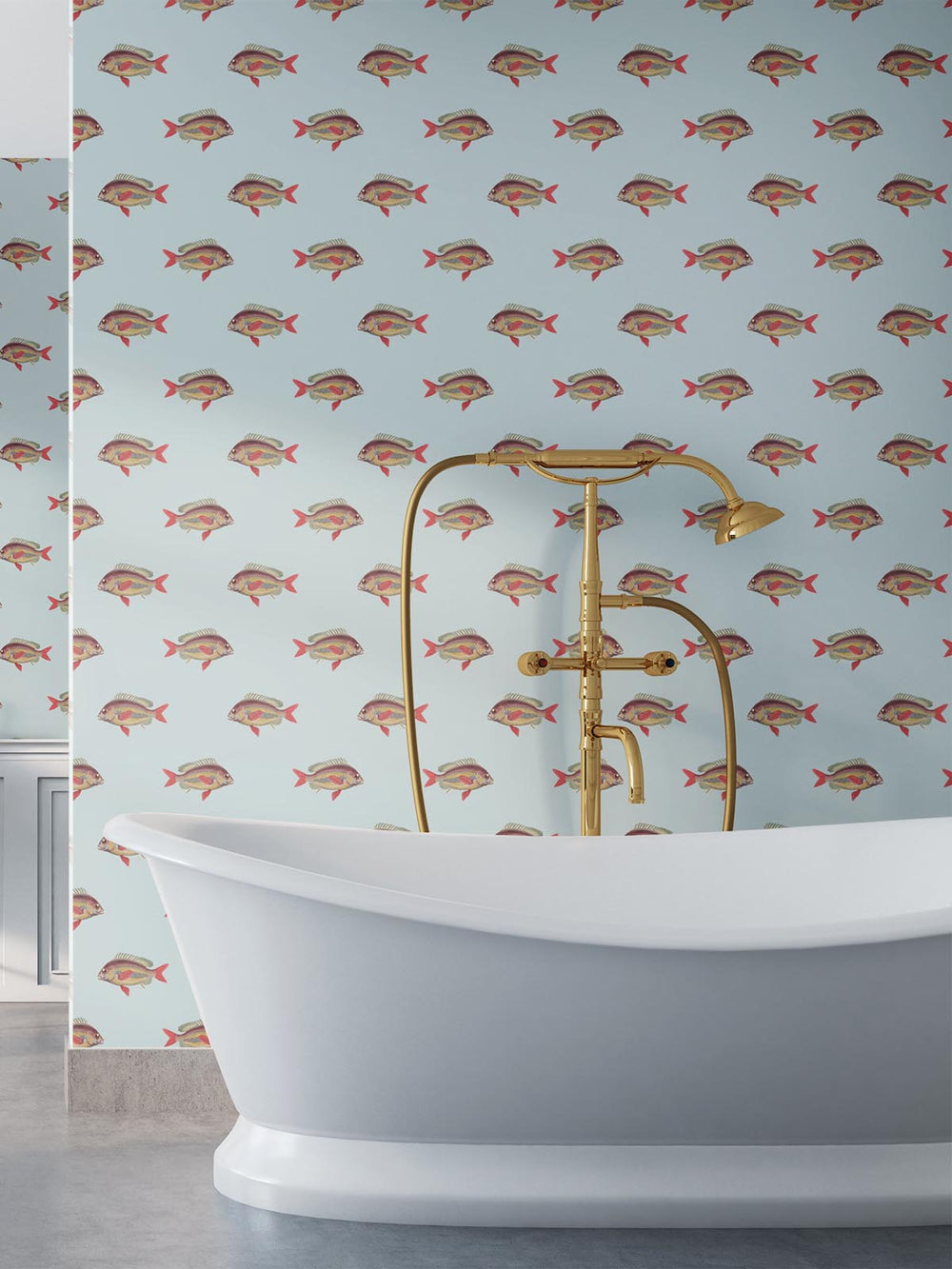 Elegant designer pale blue fish wallpaper design on a bathroom wall behind a roll top bath